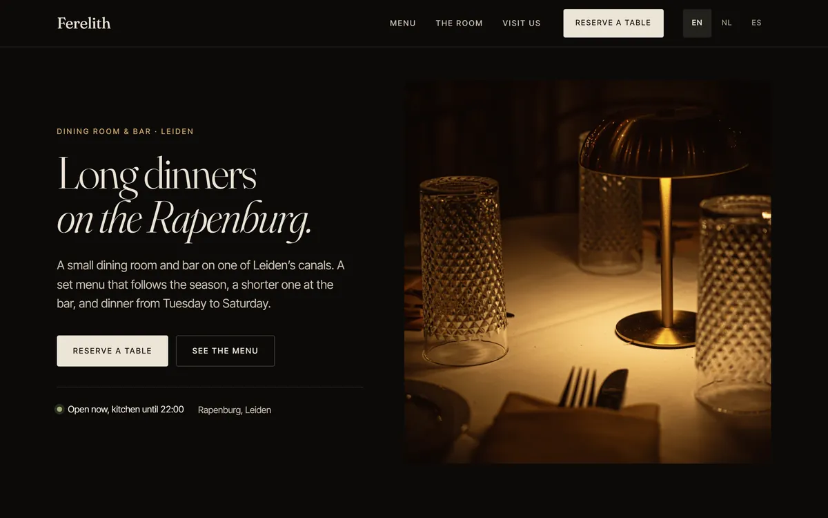 Home page of the Ferelith demo: the headline Long dinners on the Rapenburg, next to a photo of a brass table lamp between cut-glass tumblers