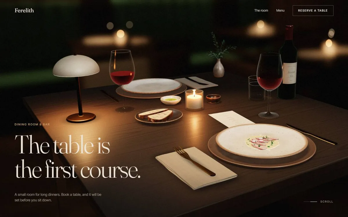Demo site for Ferelith: a candlelit table for two with wine, bread and a first course in a small dining room